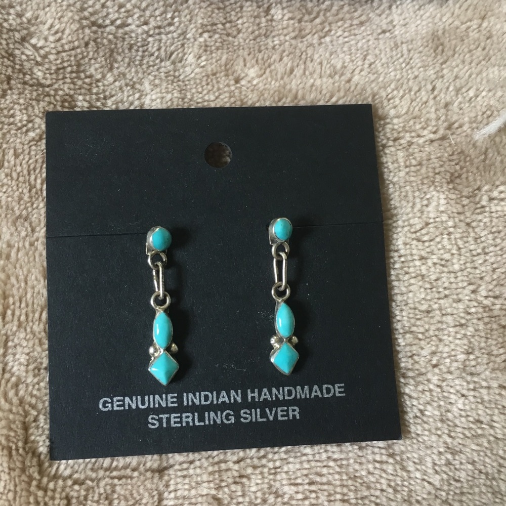 Handmade sterling silver earrings with blue stones